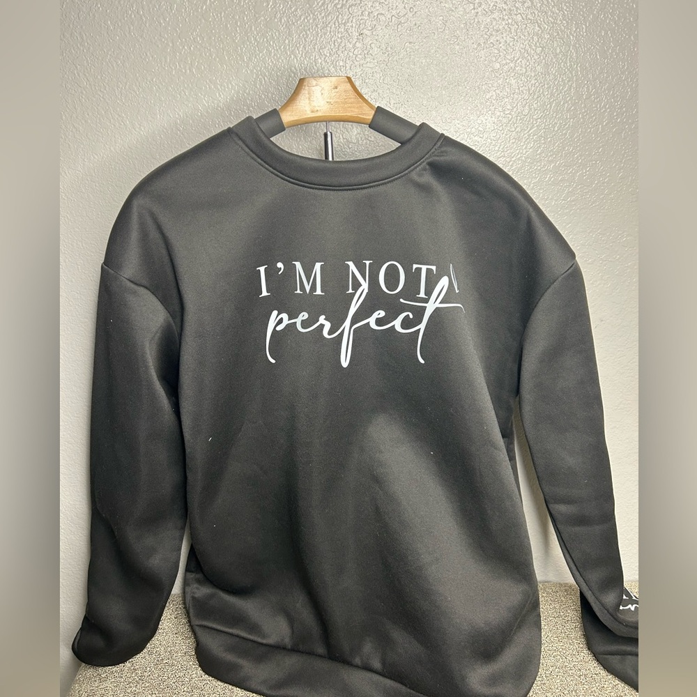 Women pull over sweater.